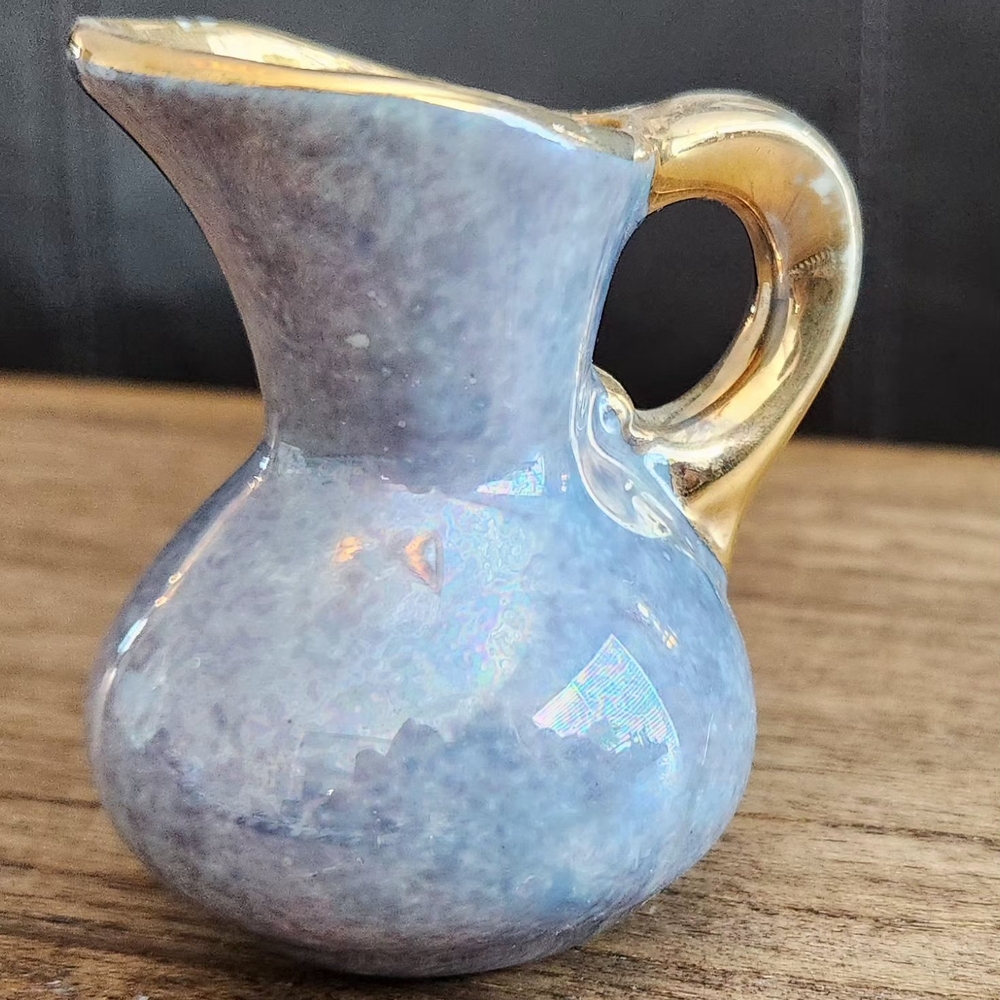 Elegant Blue and Gold Ceramic Pitcher